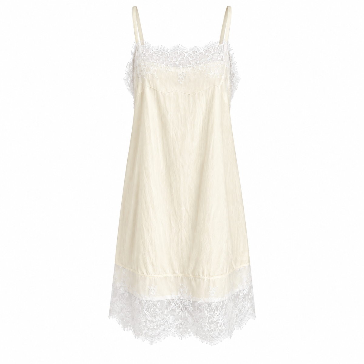 Front view of the Celeste Lace Layering Slip Dress in Soft Butter featuring eyelash lace details, adjustable shoulder straps and a flowing lightweight silhouette.