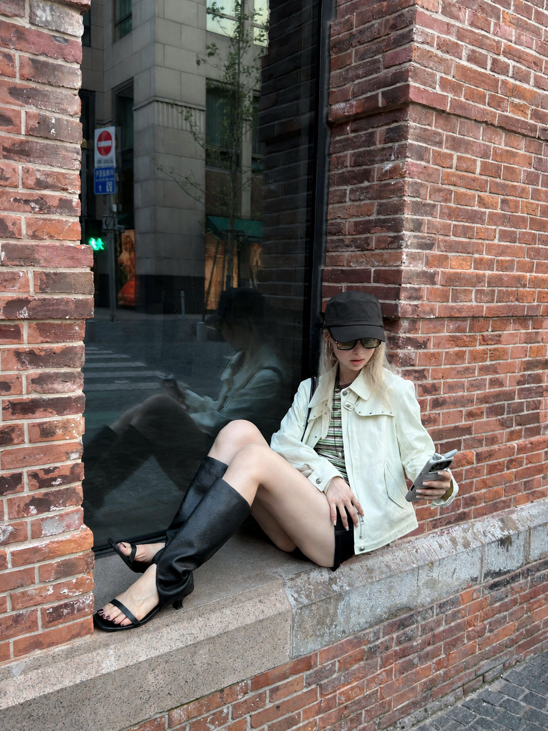 Florise Studio Vintage Stud Utility Jacket in Sage Mist styled with black shorts and tall boots, showcasing the lightweight structured fit and everyday utility design.