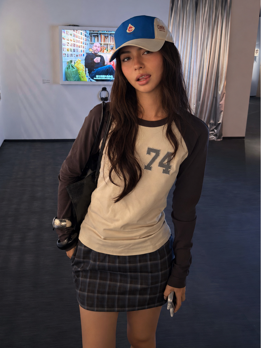 Low-Rise Plaid A-Line Mini Skirt in Midnight Plaid paired with a vintage raglan long sleeve tee, front outfit view | Florise Studio