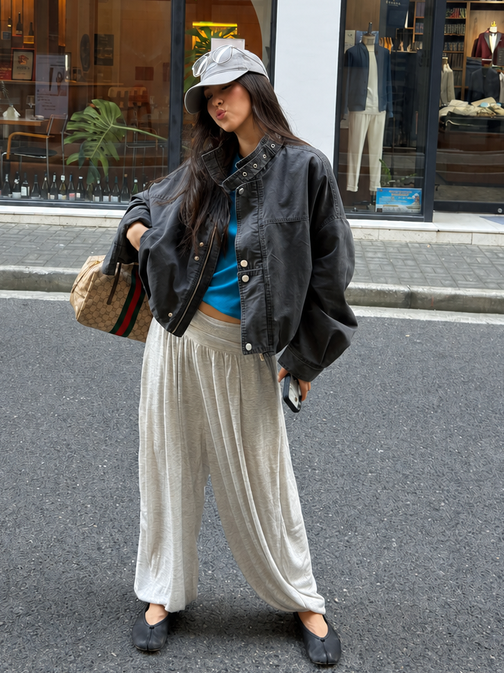 Model wearing the Florise Studio Oversized Vintage Utility Stand Collar Jacket in Washed Charcoal with an oversized fit, premium cotton fabric, structured utility details, and everyday streetwear styling.