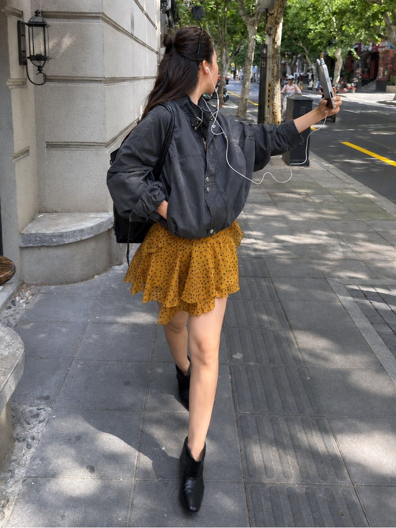 Model styling the Florise Studio Oversized Vintage Utility Stand Collar Jacket in Washed Charcoal with a relaxed oversized silhouette, structured utility details, and everyday streetwear styling.