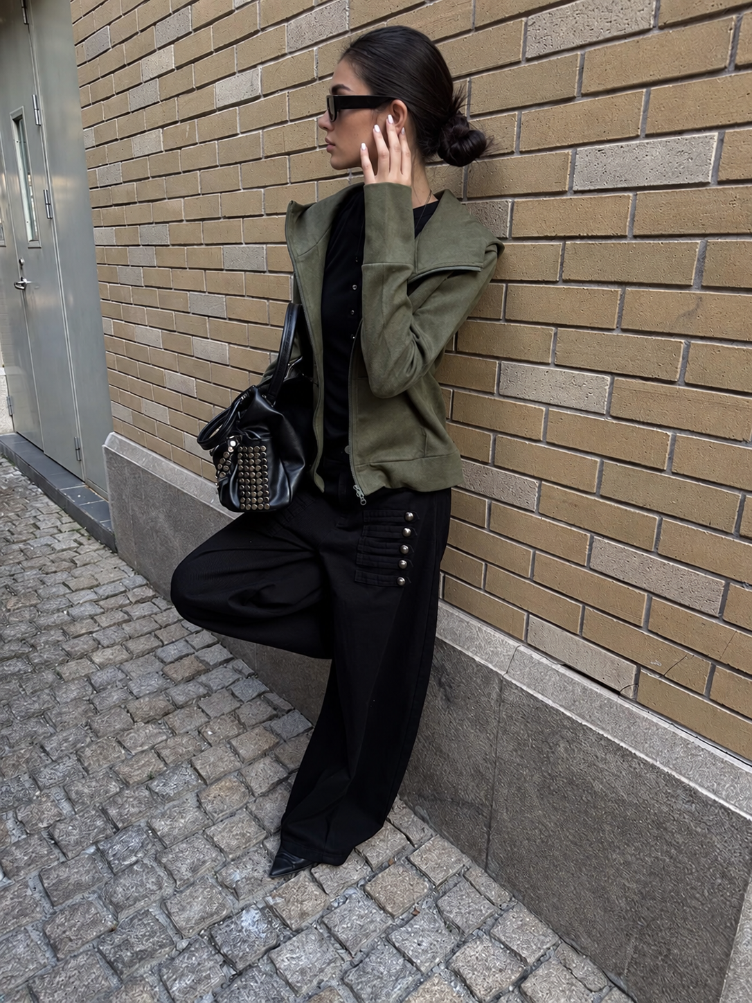 Button Tab Low Rise Wide Leg Jeans in Black — side styling view