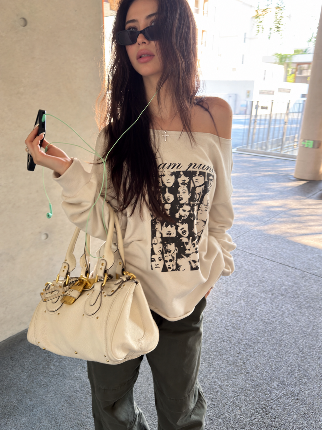 Off-Shoulder Cotton Graphic Top in cream – close view of the graphic print and off-shoulder neckline