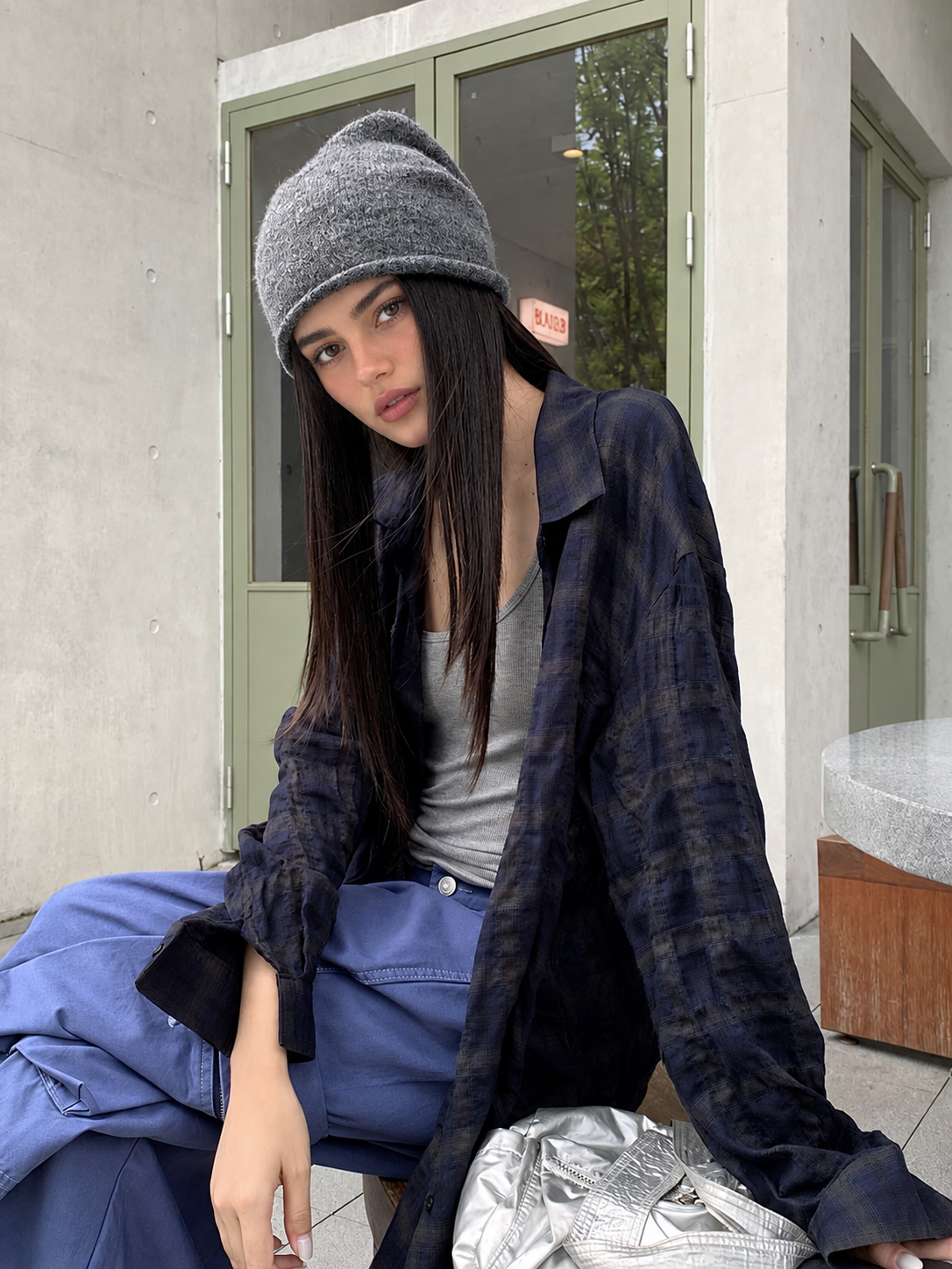 Oversized Textured Plaid Long Sleeve Shirt in Navy Plaid — seated close-up view
