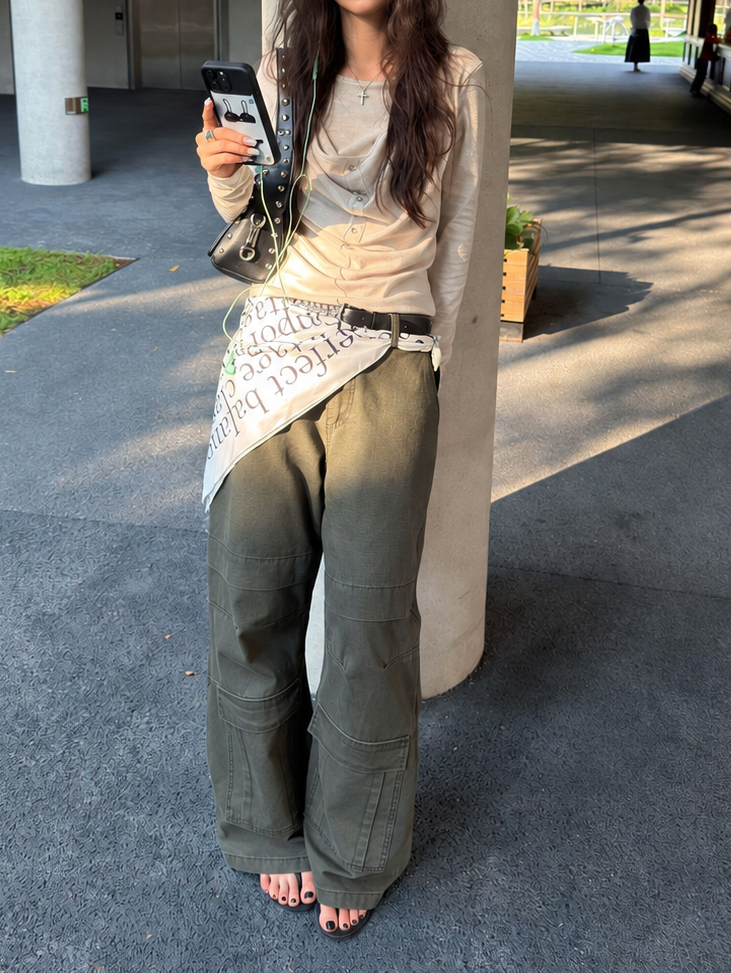 Close styling view of washed gray cargo pants