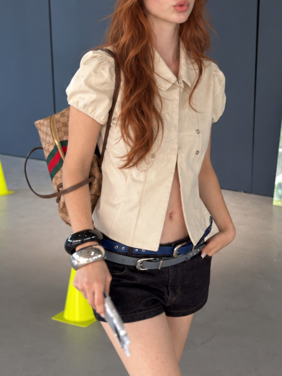 Ivory Cream Vintage Military Puff Sleeve Shirt styled with denim shorts for a modern streetwear look.