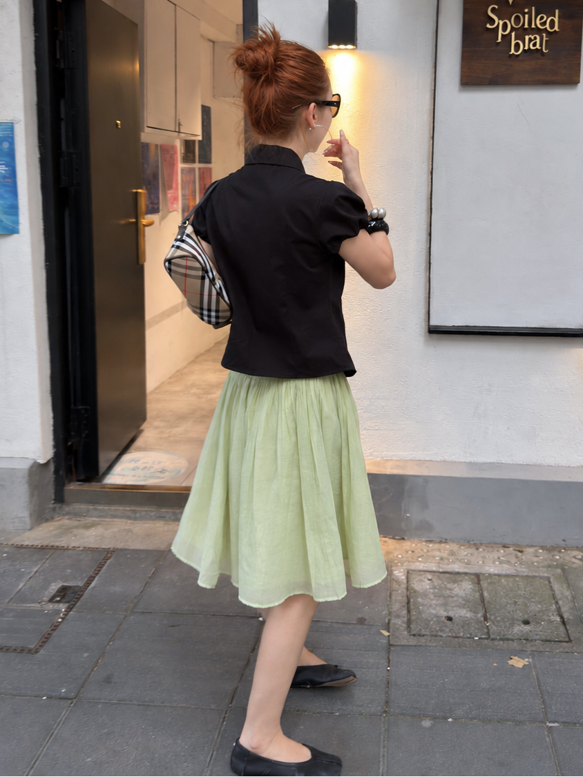 Back view of the Vintage Military Puff Sleeve Shirt in Midnight Noir highlighting the tailored fit and puff sleeves.